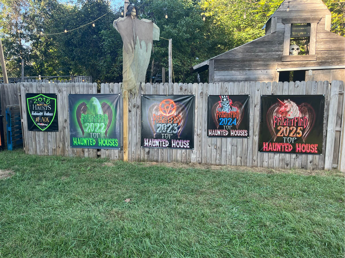 Madhaunter's Madhouse Top Haunted House banners on display at the Madhaunters Haunted House. 